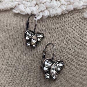 Silver butterfly earrings.